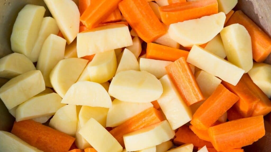 Do carrots take longer to boil than potatoes