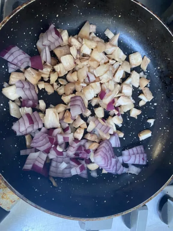 frying mushrooms and onions together